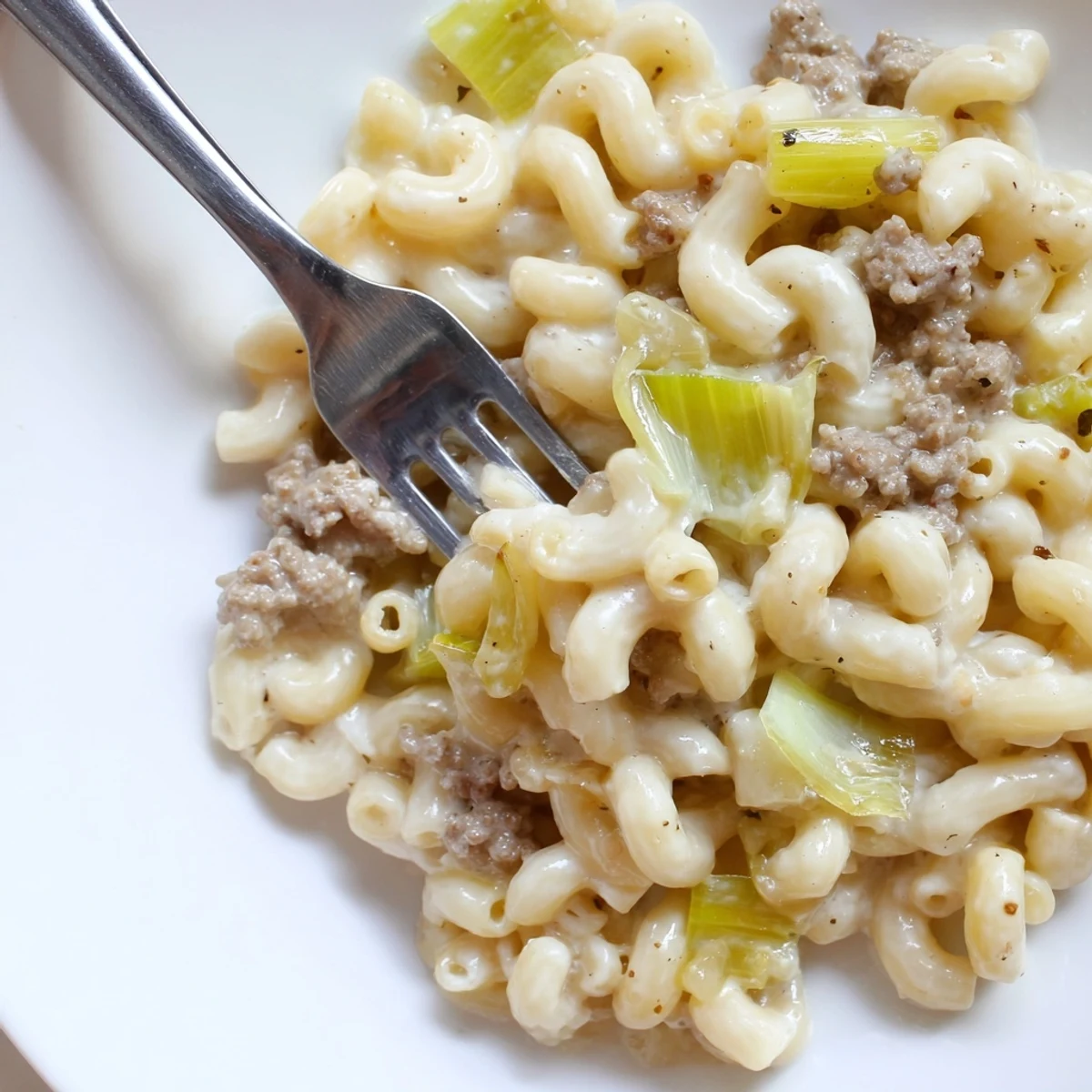Deliciously cheesy leek beef macaroni, perfect for family dinners or gatherings.  