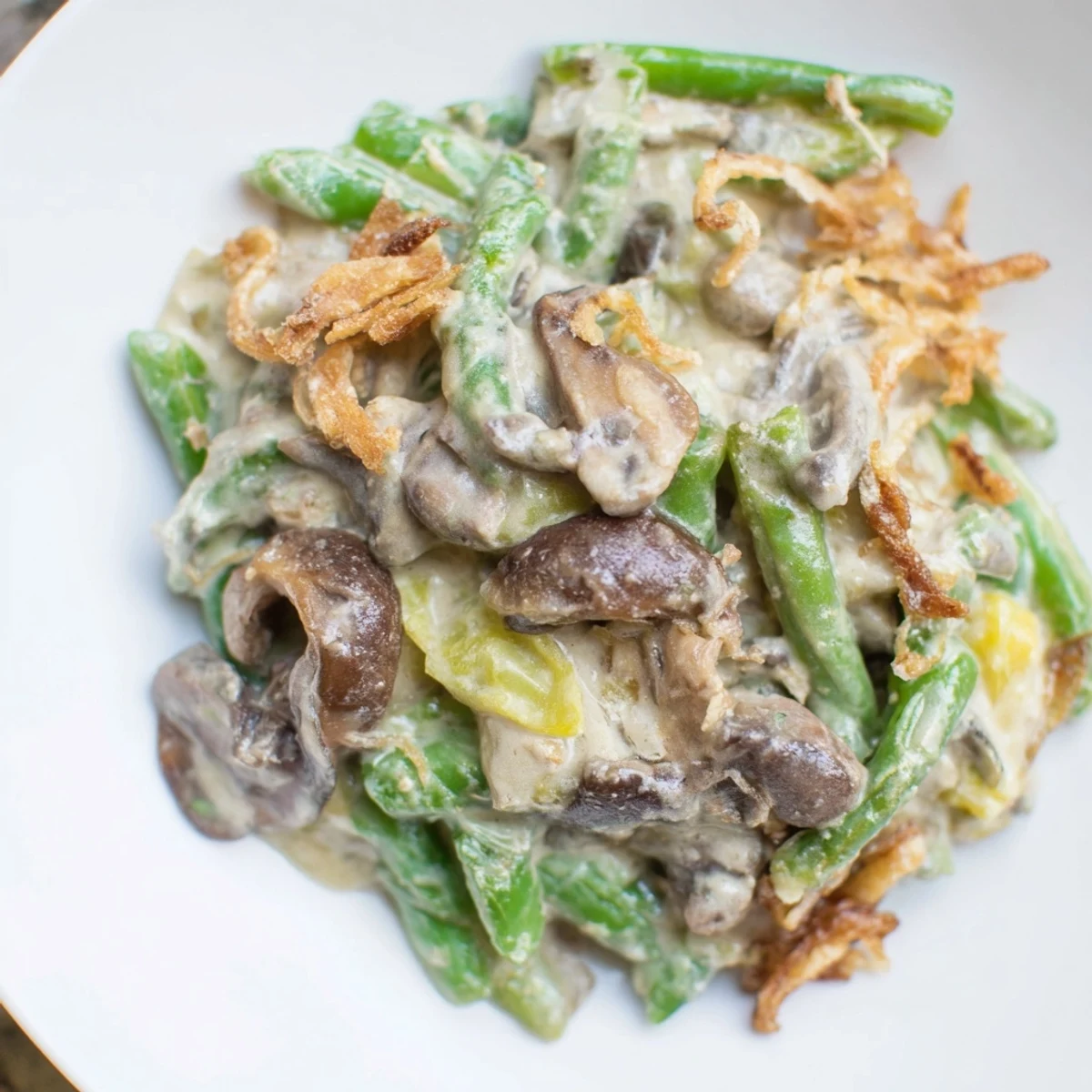Tender green beans are coated in a rich sauce in this classic Old-School Green Bean Casserole recipe.