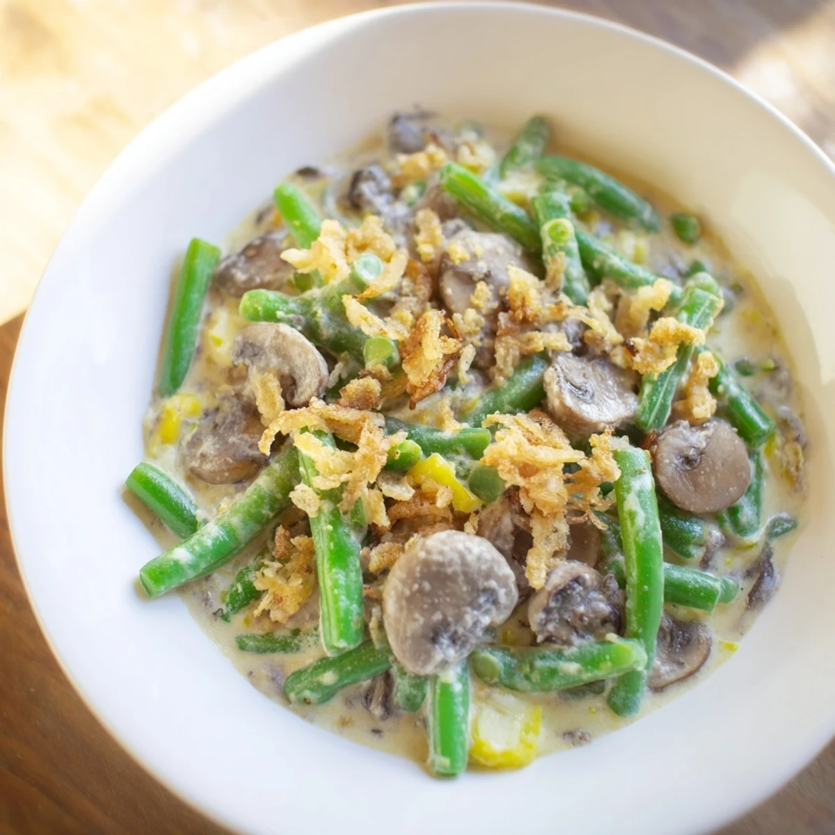 Creamy Old-School Green Bean Casserole with golden fried onions, a comforting holiday classic dish.