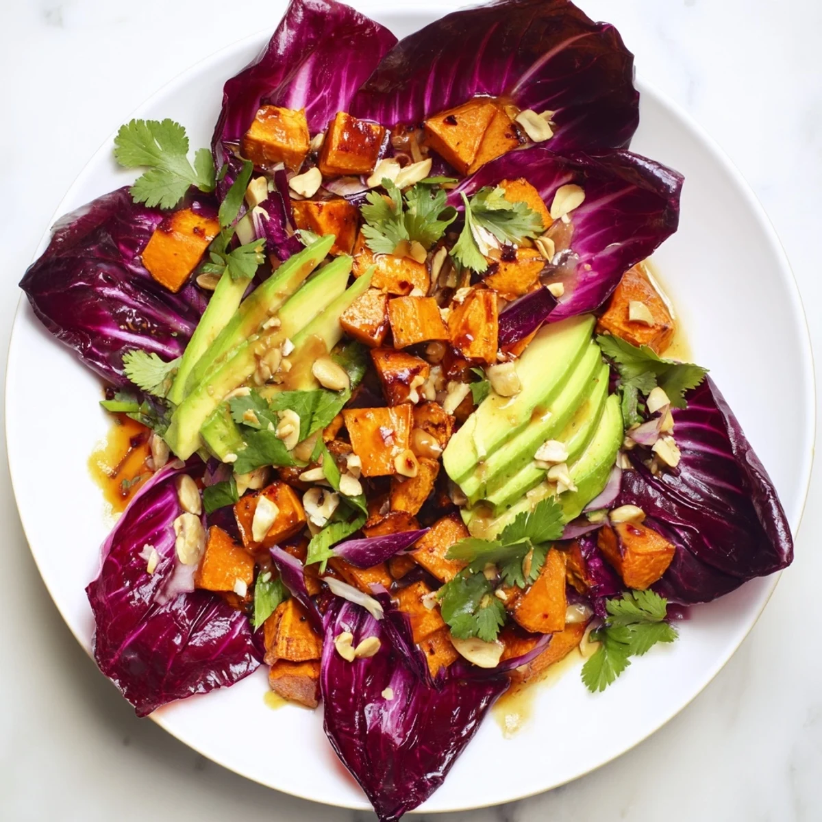 Imagine the crunchy radicchio and peanut-covered Spiced Peanut Sweet Potato & Radicchio Salad Bowl.