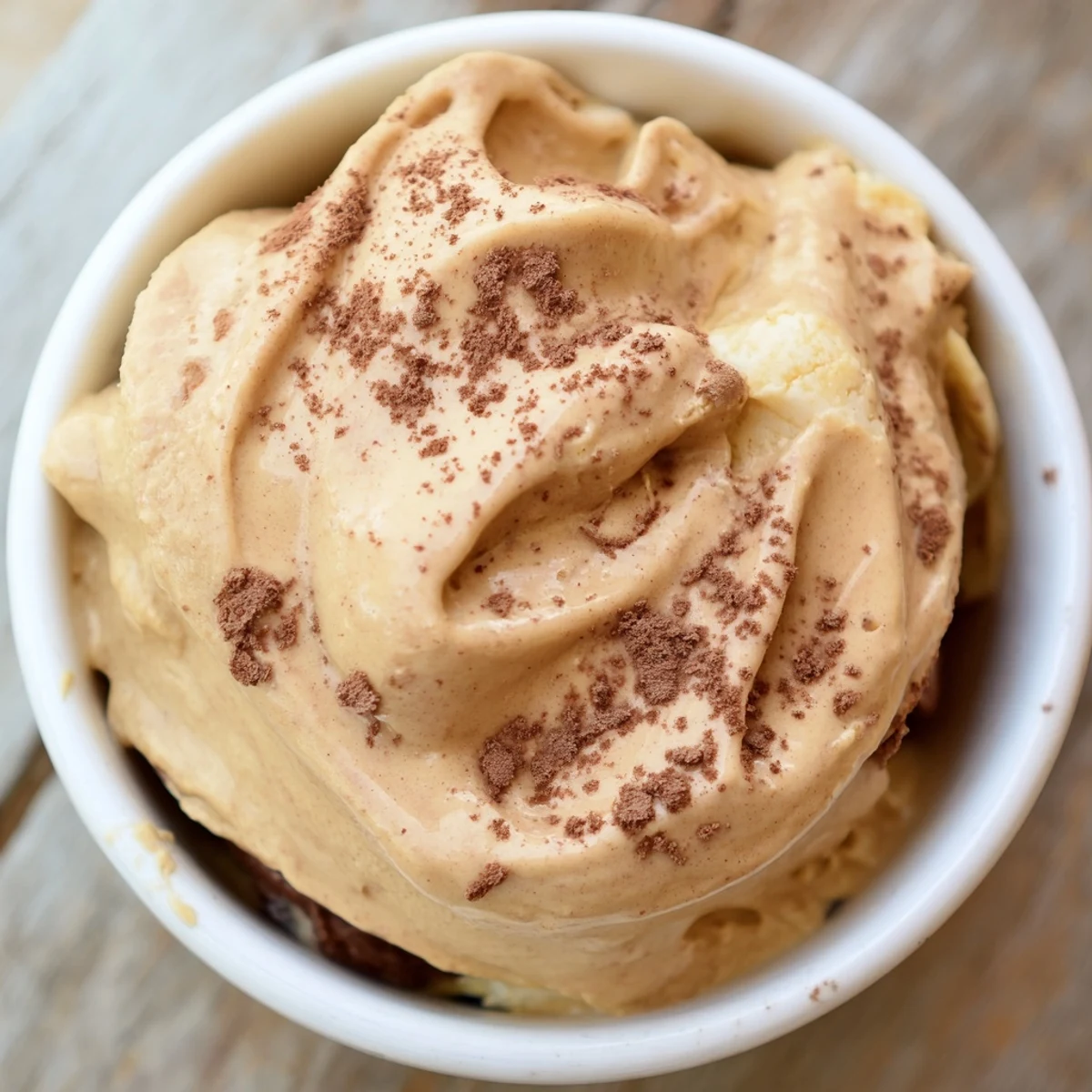 Creamy peanut butter banana ice cream swirled with rich peanut butter and ready to enjoy.