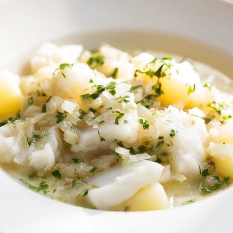 Creamy Icelandic Fish Stew, filled with tender cod and potatoes, ready for a cozy dinner.