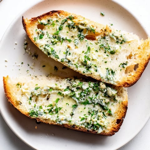 Golden, bubbly Herb Butter Toast, the perfect easy appetizer with melted, herbed butter.