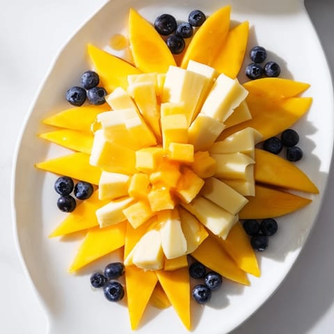 Bright, appetizing photo of a Shooting Star Snack Board with colorful fruits, cheeses, and crackers.