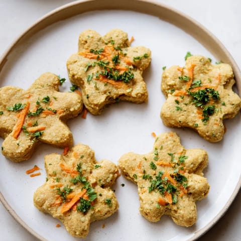 Golden-brown Friendly Dog Paw Treats, appealing homemade dog treats for a happy pup.