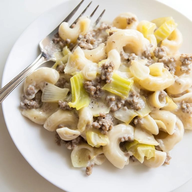 Rich and creamy leek beef macaroni, a comforting dish with hearty flavors.