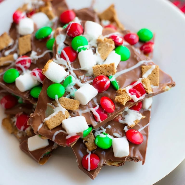 Homemade Quick Christmas Smores Bark, a delicious treat with melted chocolate and festive toppings ready to enjoy.